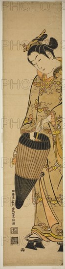 Young Woman with Umbrella, c. 1740s, Ishikawa Toyonobu, Japanese, 1711-1785, Japan, Hand-colored woodblock print, wide hashira-e, urushi-e, 70.4 x 16.0 cm (27 5/8 x 6 1/4 in.)
