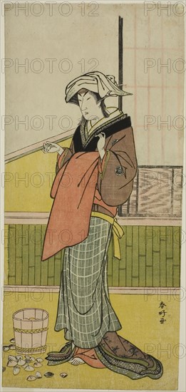 The Actor Nakamura Riko I as Moshio (?) in the Play Honda Yayoi Meoto Junrei (?), Performed at the Ichimura Theater (?) in the Seventh Month, 1778 (?), c. 1778, Katsukawa Shunko I, Japanese, 1743-1812, Japan, Color woodblock print, hosoban, 31.9 x 14.8 cm (12 9/16 x 5 13/16 in.)