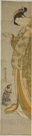 Courtesan with her Pet, c. 1769, Suzuki Harunobu ?? ??, Japanese, 1725 (?)-1770, Japan, Color woodblock print, hashira-e, 21 x 4 7/8 in.