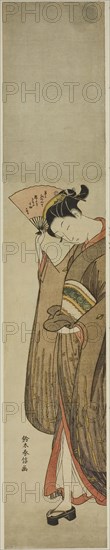 Young Woman Holding a Fan, c. 1769, Suzuki Harunobu ?? ??, Japanese, 1725 (?)-1770, Japan, Color woodblock print, hashira-e, 26 1/2 x 5 in.