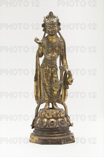 White-Robed Guanyin (Avalokiteshvara) in Thrice-Bent Pose (Tribhanga), Holding a Vase with Nectar of Immortality (Amrta), Sui dynasty (589–618), early 7th century, China, Gilt copper alloy, 19.5 × 5.3 × 5.3 cm (7 5/8 × 2 1/8 × 2 1/8 in.)