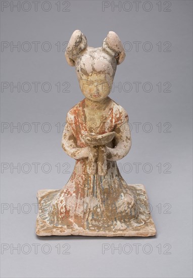 Female Musician, Tang dynasty (A.D. 618–907), late 7th/early 8th century, China, Earthenware with polychrome pigments, 20.9 × 13.3 × 13.5 cm (8 1/4 × 5 1/4 × 5 5/16 in.)