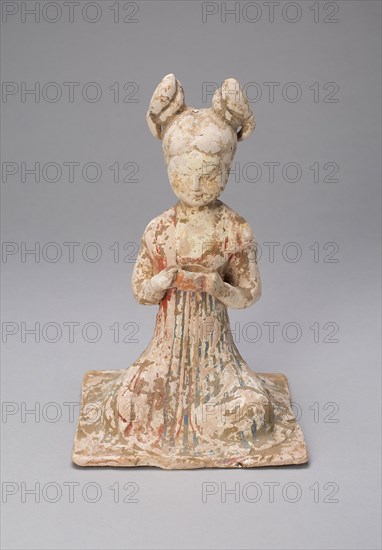 Female Musician, Tang dynasty (A.D. 618–907), late 7th/early 8th century, China, Earthenware with polychrome pigments, 20.6 × 13.3 × 12.8 cm (8 1/8 × 5 1/4 × 5 1/16 in.)