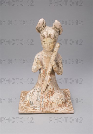 Female Musician, Tang dynasty (A.D. 618–907), late 7th/early 8th century, China, Earthenware with polychrome pigments, 21.1 × 13.6 × 13.4 cm (8 5/16 × 5 3/8 × 5 1/4 in.)