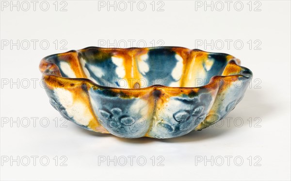 Lobed Bowl with Stylized Florets, Tang dynasty (618–906), first half of 8th century, China, Earthenware with three color (sancai) lead glazes and underglaze molded decoration, 3.3 × 10.4 × 9.9 cm (1 5/16 × 4 1/16 × 3 7/8 in.)