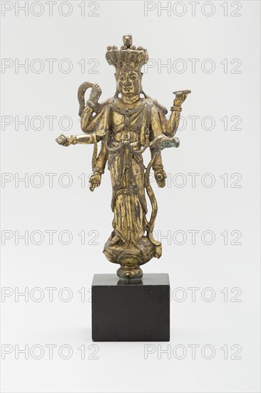 Eleven-Headed and Six-Armed Guanyin (Avalokiteshvara) Standing on a Lotus, Tang dynasty (618–907), c. 9th century, China, Gilt copper alloy, 9.3 × 3.5 × 2.5 cm (3 3/4 × 1 3/8 × 1 in.)