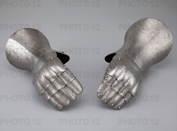 Pair of Mitten Gauntlets, c. 1500 with 19th century restoration, Spanish, Spain, Steel, L. 25.4 cm (10 in.) (each)