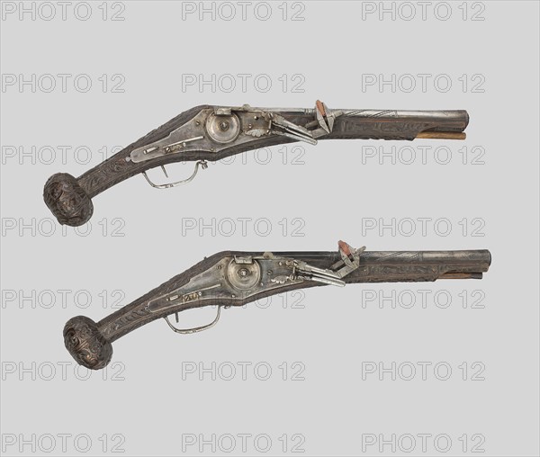 Pair of Wheellock Pistols, c. 1570, German, Nuremberg, Nuremberg, Wood and steel, Overall L.: 57.8 cm (22 3/4 in.)
