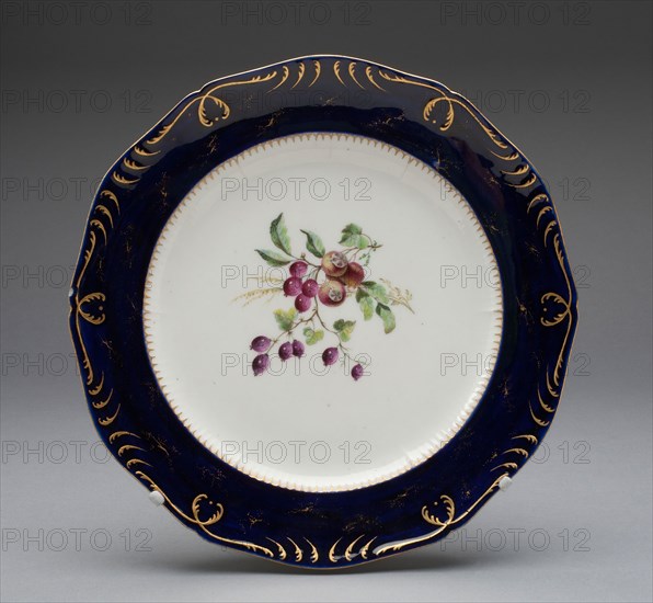 Plate, c. 1752, Vincennes Porcelain Manufactory, French, founded 1740 (known as Sèvres from 1756), Vincennes, Soft-paste porcelain, dark blue ground, polychrome enamels, and gilding, H. 3.5 cm (1 3/8 in.), diam. 25.2 cm (9 15/16 in.)