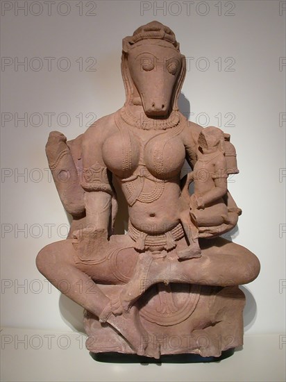 Yogini Hayagriva Seated Holding a Child, 11th century, India, Uttar Pradesh or Madhya Pradesh, India, Beige sandstone, 116.2 x 72.4 x 30.5 cm (45 3/4 x 28 1/2 x 12 in.), Guardian Lion, Angkor period, 12th century, Cambodia, Cambodia, Sandstone, 83.9 × 31.8 × 45.8 cm (33 × 12 1/2 × 18 in.)