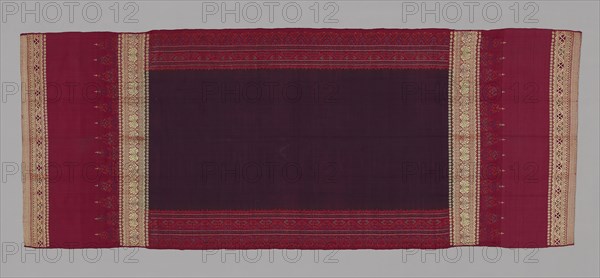 Woman’s Shoulder Cloth (Selendang limar), 19th century, Indonesia, Sumatra, Palembang, Sumatra, Silk and gold-leaf-over-lacquered-paper-strip wrapped silk, warp and weft resist dyed (warp and weft ikat) plain weave with supplementary patterning and brocading wefts, 219.7 x 87 cm (86 1/2 x 34 1/4 in.)