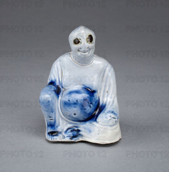 Seated Buddha, 1750/65, Staffordshire, England, Staffordshire, Salt-glazed stoneware, cobalt blue and brown enamel decoration, 7.6 x 5.4 x 4.5 cm (3 x 2 1/8 x 1 3/4 in.)