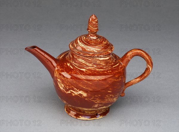 Teapot, c. 1755, Staffordshire, England, Staffordshire, Lead-glazed earthenware (agateware), 10.2 x 9.5 x 7 cm (4 x 4 3/4 x 2 3/4 in.)