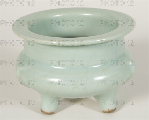 Cylindrical Tripod Censer (Incense Burner) with Cloud-Scroll Feet, Southern Song dynasty (1127–1279), China, Longquan ware, glazed stoneware with underglaze molded decoration, H. 7.4 cm (2 15/16 in.), diam. 9.8 cm (3 7/8 in.)