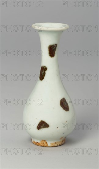 Small Bottle Vase, Yuan dynasty (1271–1368), first half of the 14th century, China, Qingbai ware, glazed porcelain in iron spots, H. 10.8 cm (4 1/4 in.), diam. 5.1 cm (2 in.)