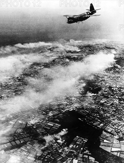 A B25 Marauder bomber of the USAAF dive bombs Cherbourg Peninsula during WW2 air raid  1944