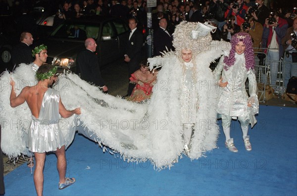 Elton John and David Furnish arriving at Elton's 50th birthday party at Hammersmith Palais. 6th April 1997.