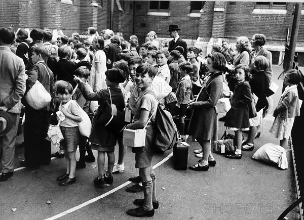 Schoolchildren at St Michaels Church School in Buckingham Palace Road London rehearse for a possible evacuation during WW2  1939