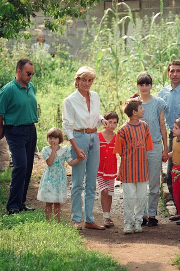 Diana, Princess of Wales makes a three day visit to Bosnia - Herzegovina as part of her campaign to raise awareness about the devastating effects landmines have on peoples lives and to call for a complete ban on the production, sale and use of land mines.
The trip was organised by the American-based Landmine Survivors Network. 
Here she is on the 2nd day of her visit. 
9th August 1997.