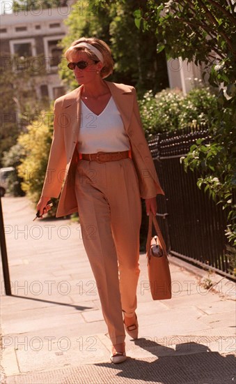 PRINCESS DIANA WEARING FAWN SUIT, WHITE TOP AND SUNGLASSES AND ALICE BAND AFTER HAVING LUNCH WITH A MYSTERY MAN IN CHELSEA - 26/05/1997.