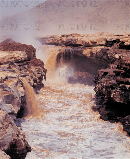 Torrent and rocks, China