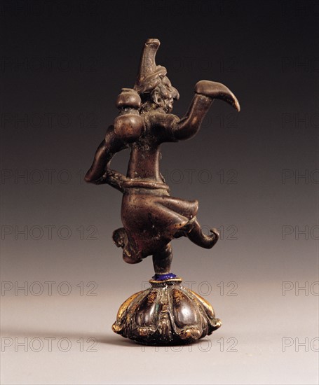 Statuette en cuivre, personnage de style Perse, découvert dans le Gansu