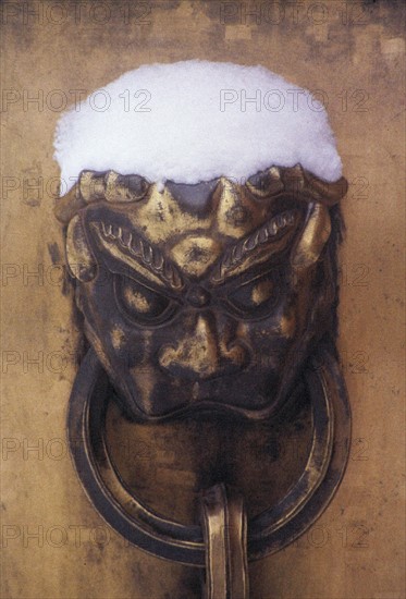 A brass lion head on the pot,Forbidden City,Beijing,China