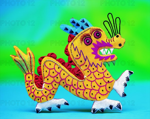 A piece of Chinese folk cloth art of a dragon