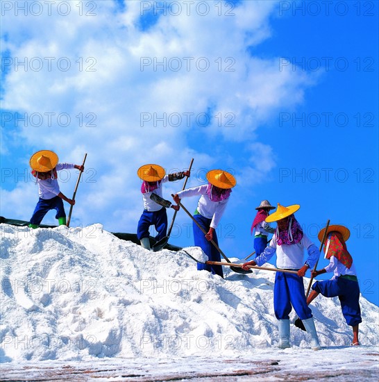 Huian woman working on salt field,Fujian,China