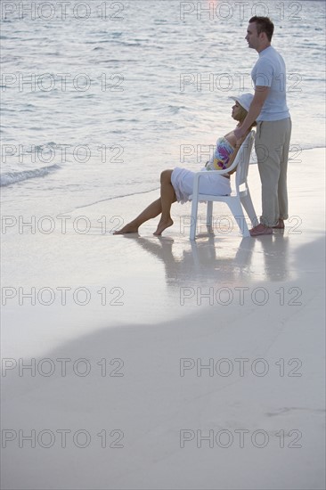 Couple relaxing at the beach.