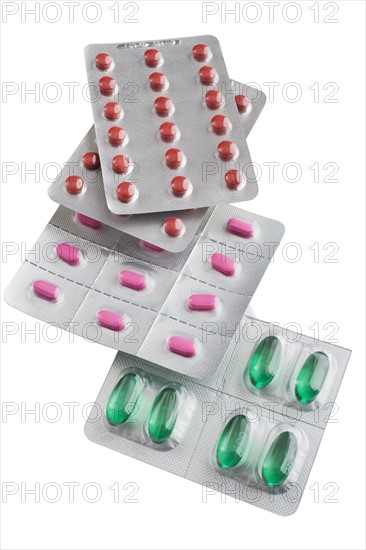 Assorted medication in bubble packs.