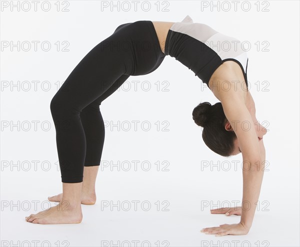 Woman practicing yoga.