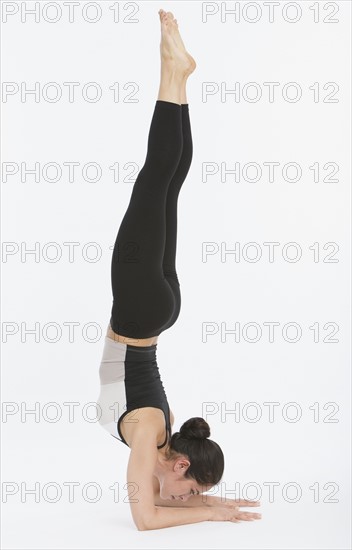 Woman practicing yoga.