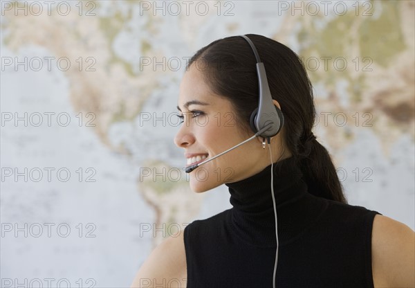 Businesswoman wearing headset.