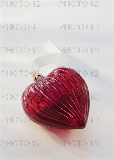 Close up of heart-shaped ornament.