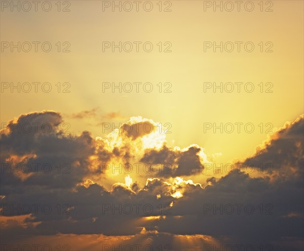 Sun shining through clouds. Date : 2008