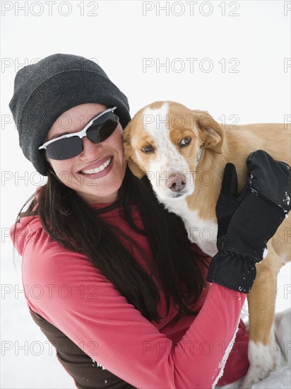 Woman hugging dog. Date : 2008