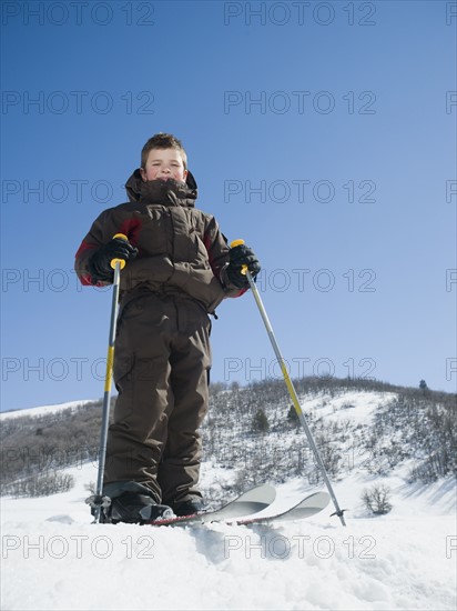 Boy standing on skis. Date : 2008