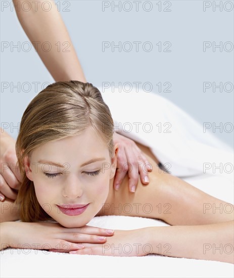 Young woman getting massage. Date : 2008