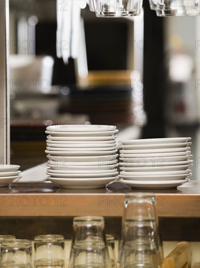 Clean dishes in restaurant.