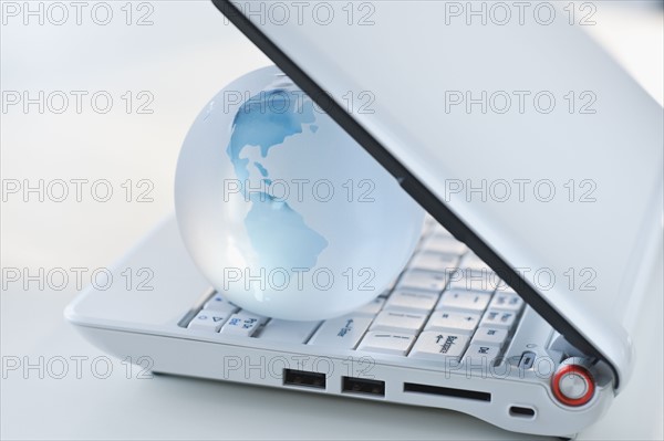 Globe inside laptop.