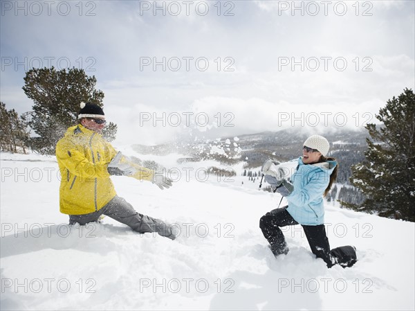 A couple outdoors in the snow