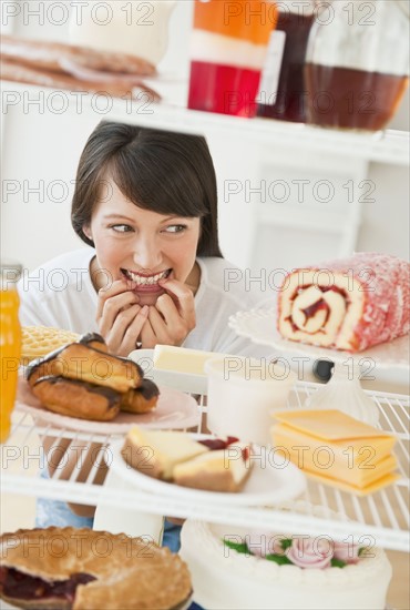 Woman looking at sweets.