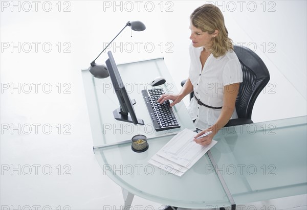 Businesswoman working on computer.