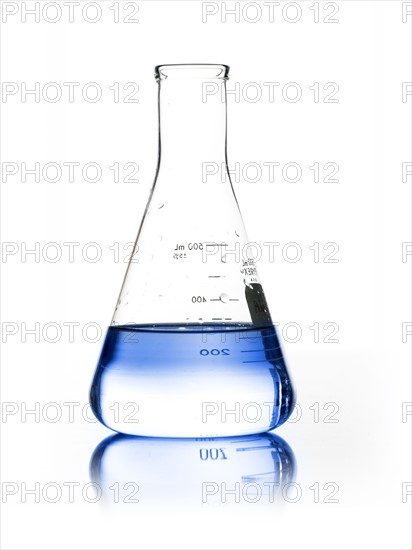 Blue liquid in beaker. Photo. David Arky