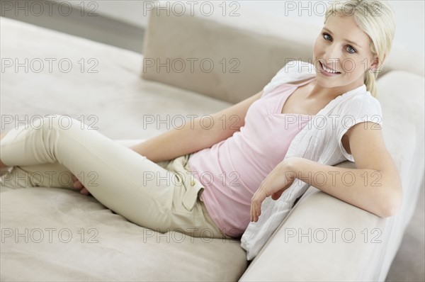 Pretty blond woman relaxing. Photo. momentimages