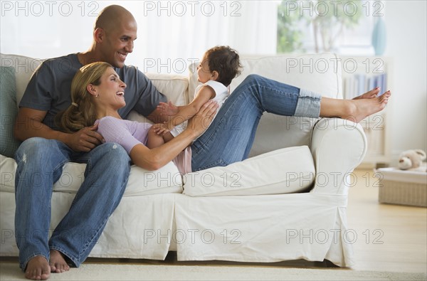 Young family with small girl (12-18 months).