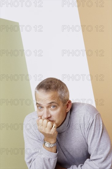 Handsome gray haired man. Photo : Fisher Litwin