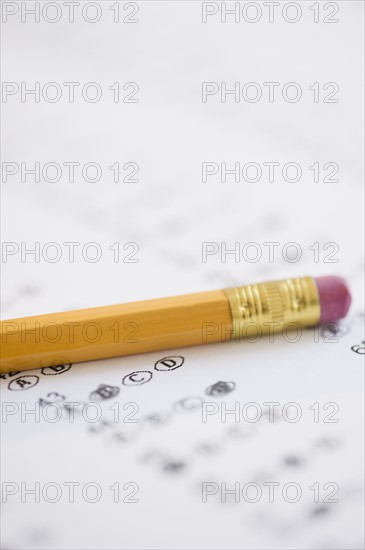 Pencil with eraser on school test sheet. Photo : Jamie Grill