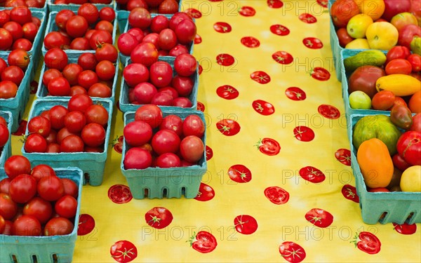 Tomatoes in boxes.